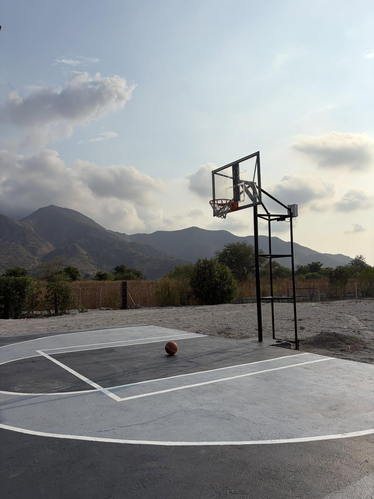 Basketball court with mountain backdrop