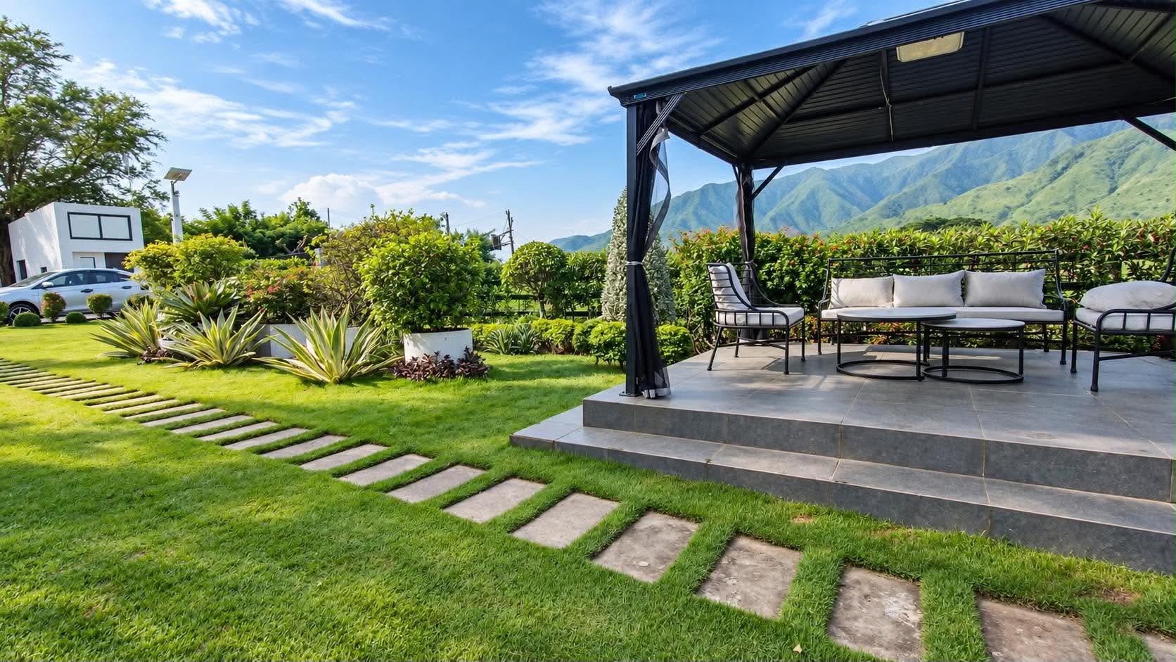 Cushioned garden gazebo with mountain views