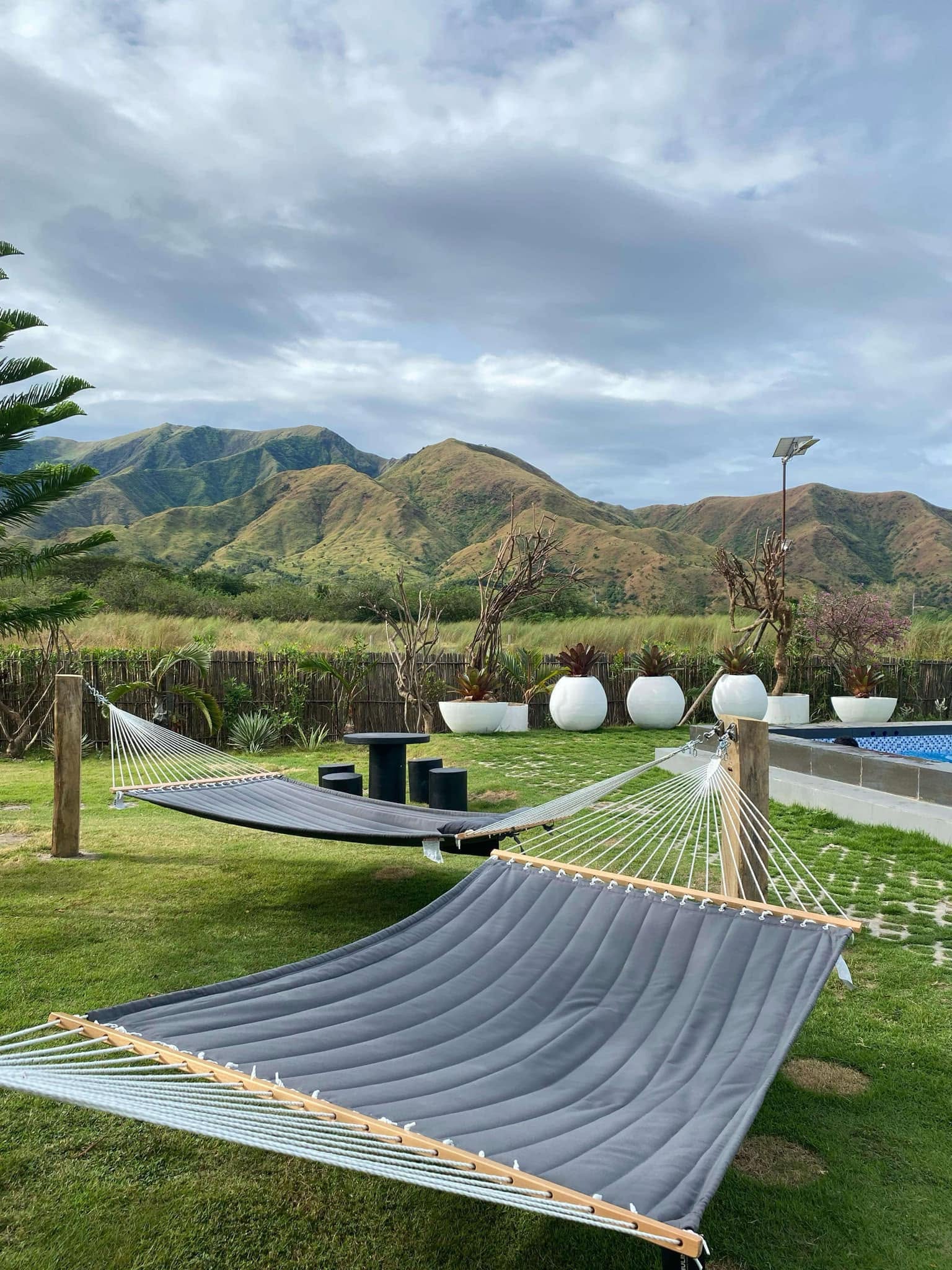 Hammocks beside the mountain-view pool