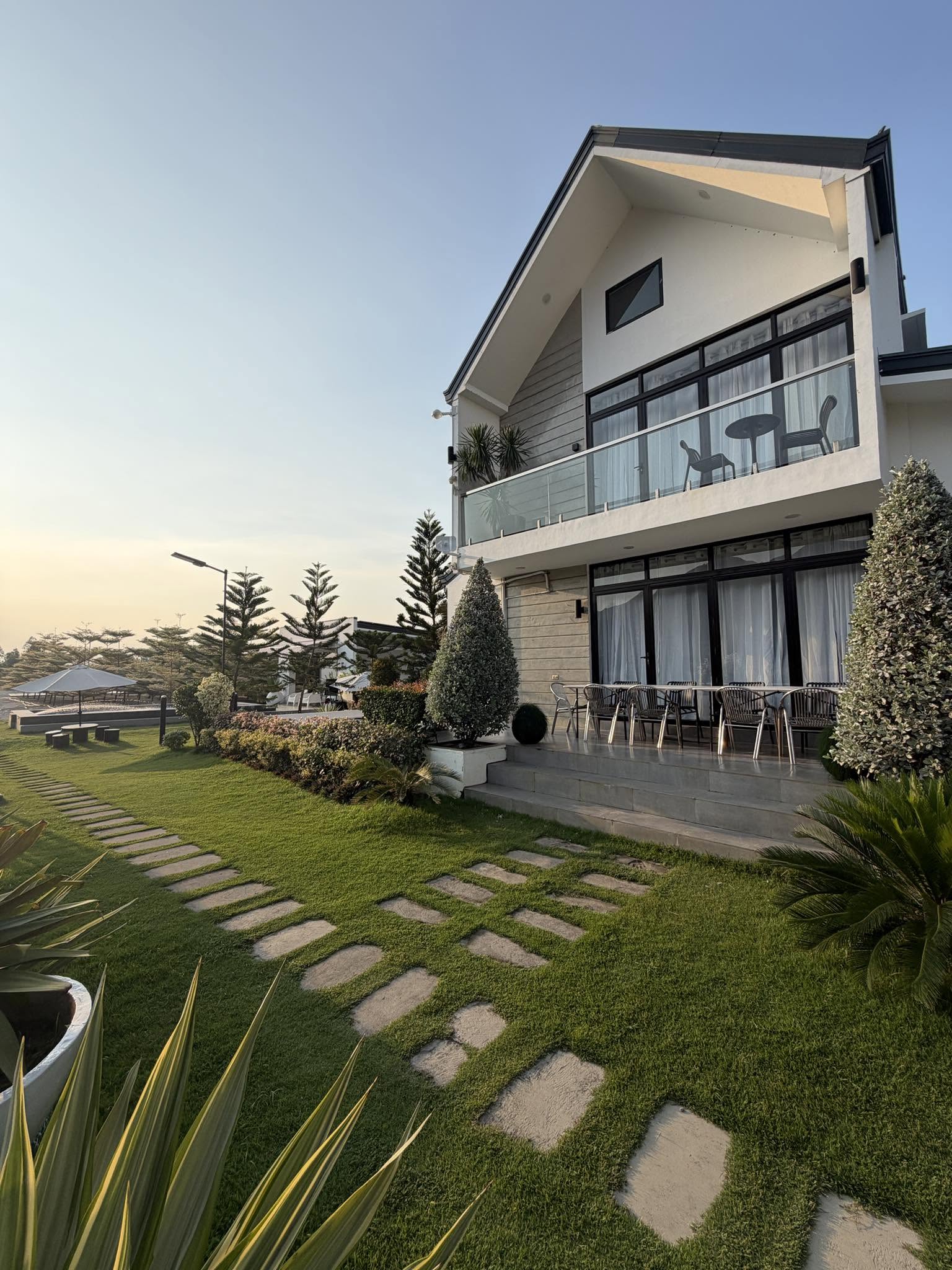 Exterior of SanChio Rest House set in a landscaped garden